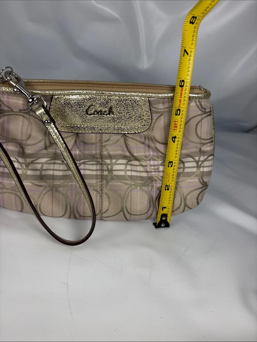 Coach Metallic Logo Wristlet in Beige and Gold